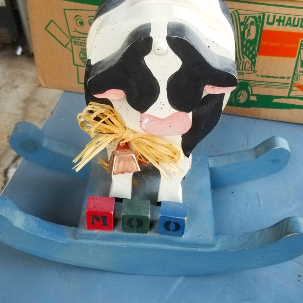 Black and white wood Cow on rocker decor